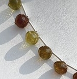 8 inch strand Grossular Garnet Onion Shape Beads