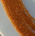 16 inch strand Mandairn garnet faceted Rondelles