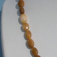16 inch strand Coral  Oval Faceted