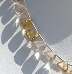 8 inch strand Golden Rutilated Quartz Trilliant Cut 